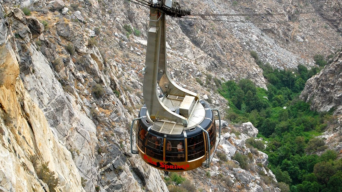 The Palm Springs Aerial Tram making its way across ruggedly scenic desert terrain