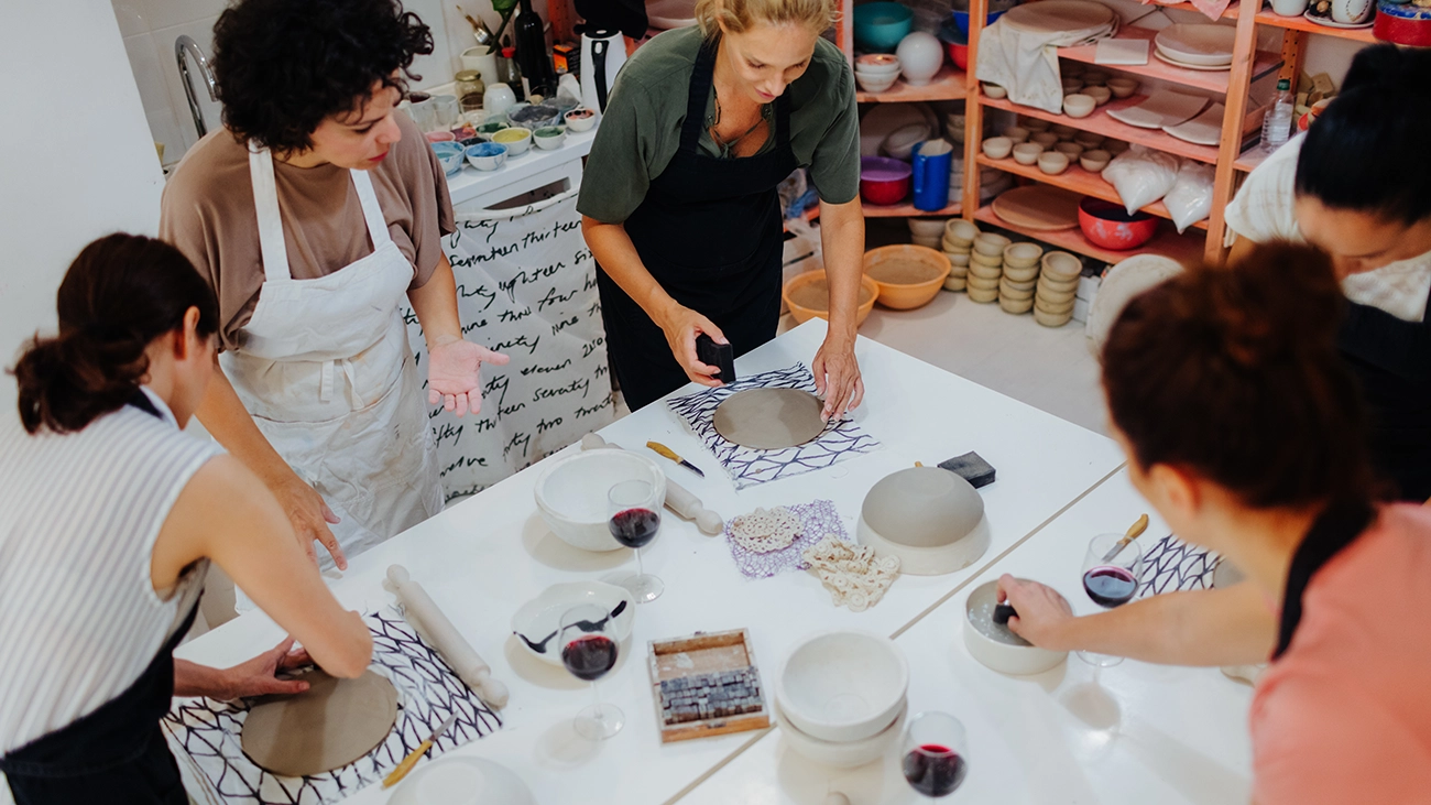Women enjoying a pottery making group class