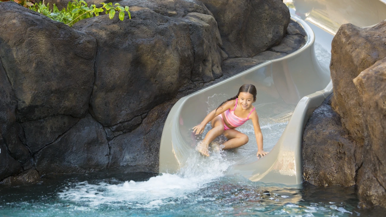 Girl on the waterslide at Hyatt Vacation Club at Kāʻanapali Beach