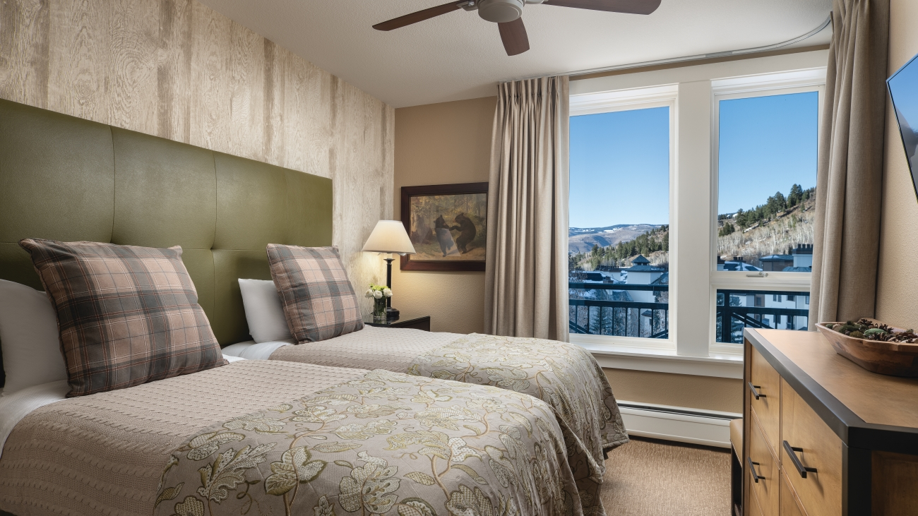 Villa bedroom with a mountain view