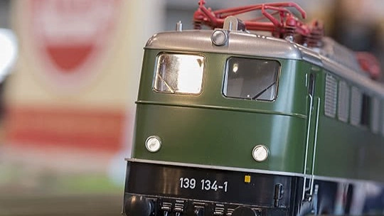 A green toy train at The World's Largest Toy Museum