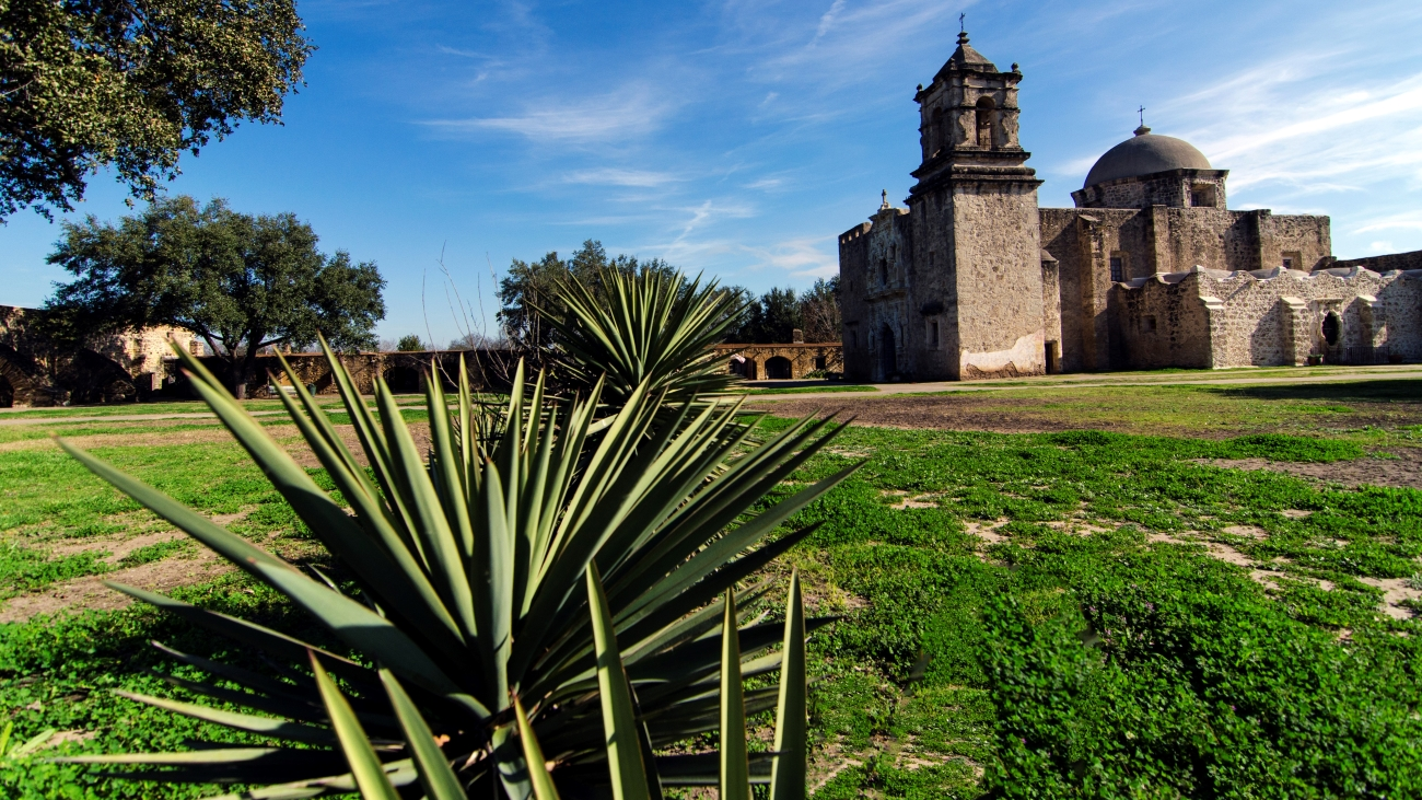 San Antonio Missions with an architectural building in the distance